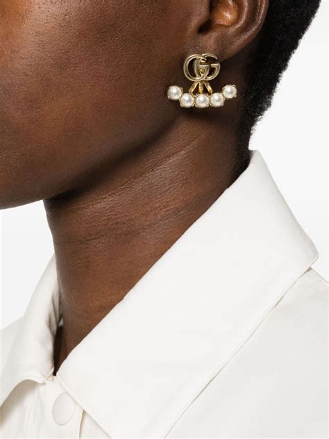 gucci pearl double g drop earrings.